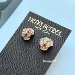 Henri bendel flower rose gold earrings